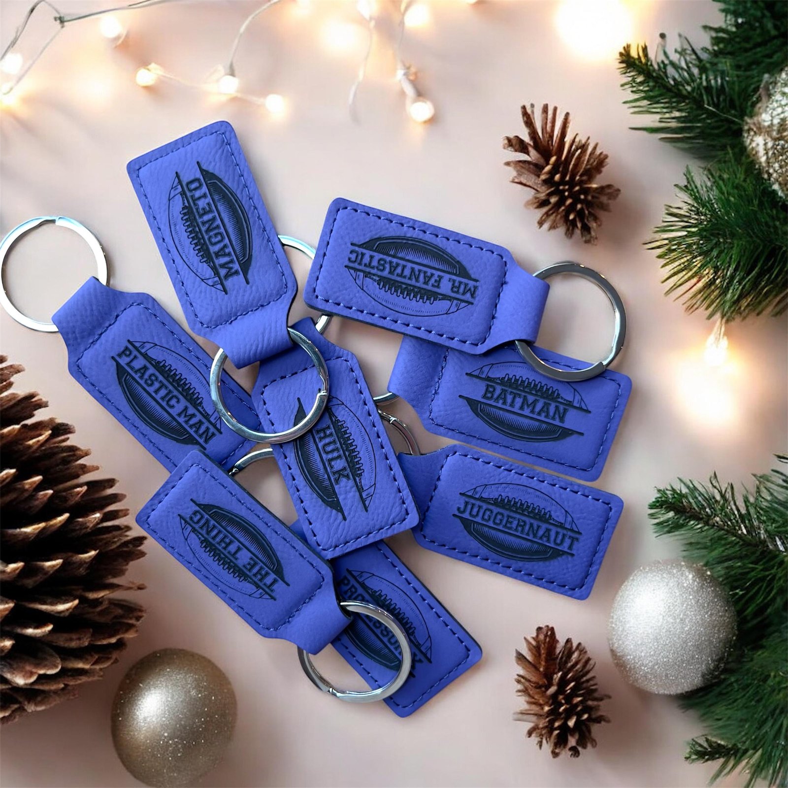 Purple vegan leatherette keychains engraved with football emblems and names