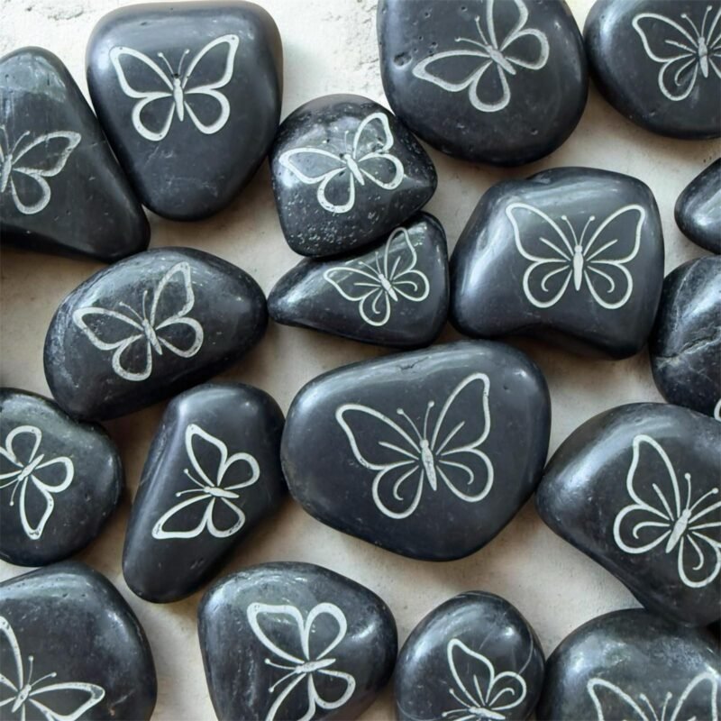 Bulk engraved river rocks with butterfly design